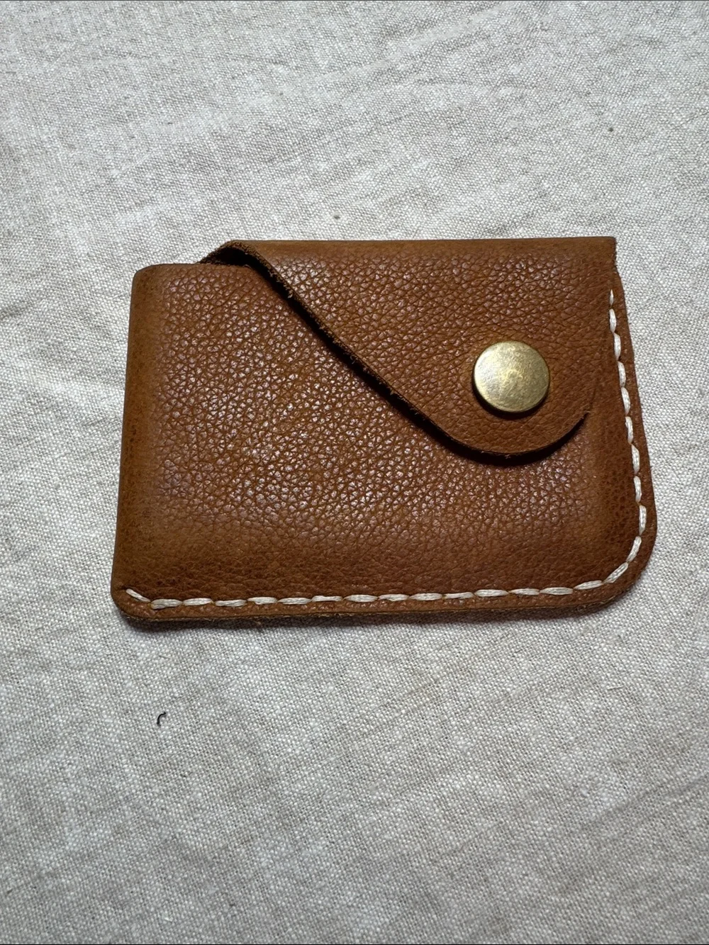 Leather card holder with metal snap. 4x3